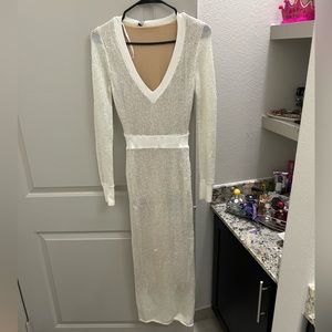 Cream net dress with light brown lining.